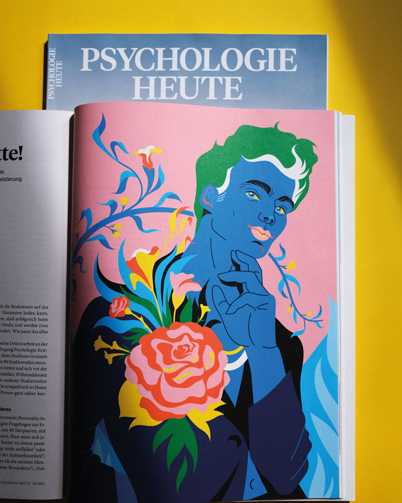 Photo of a magazine with a illustration of a beautiful young man with big flower in the lapel
